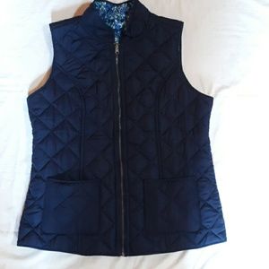 Blue and flowered print quilted vest